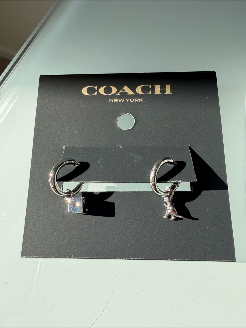 COACH Silver mini rexy and dice charm Hoop Earrings